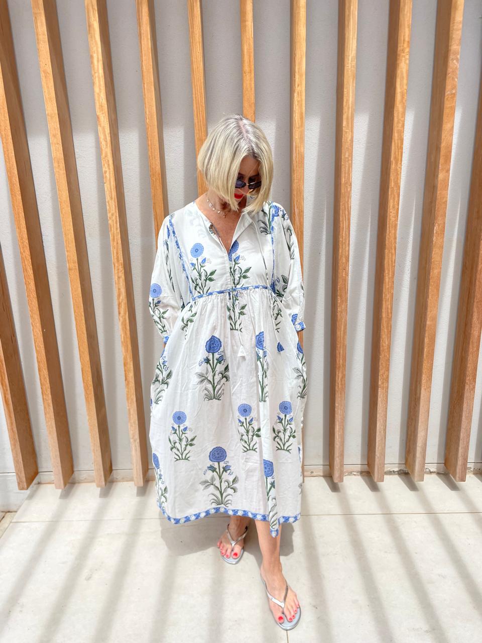 White dress with blue poppy