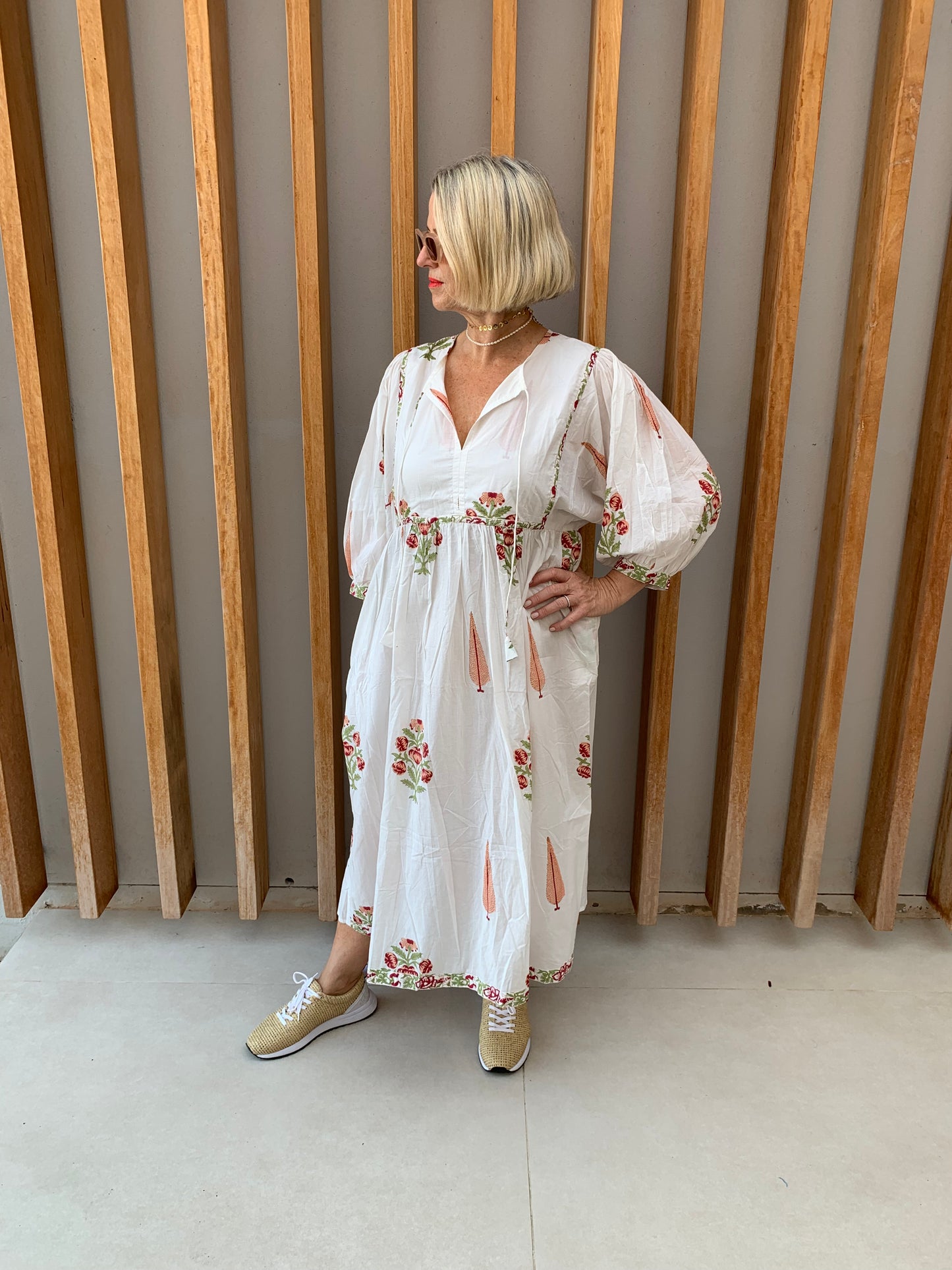 White dress with red daisy & conifer pattern
