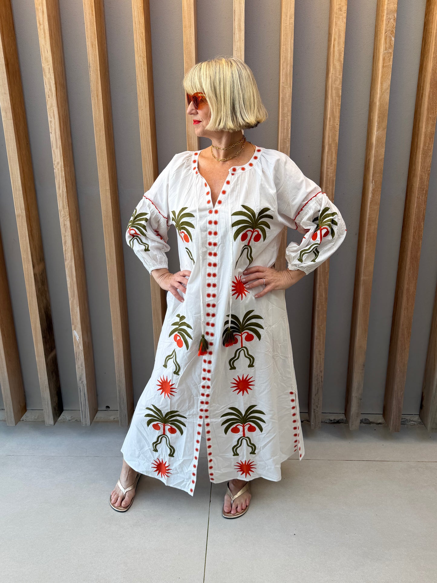 White dress with geometric palm pattern
