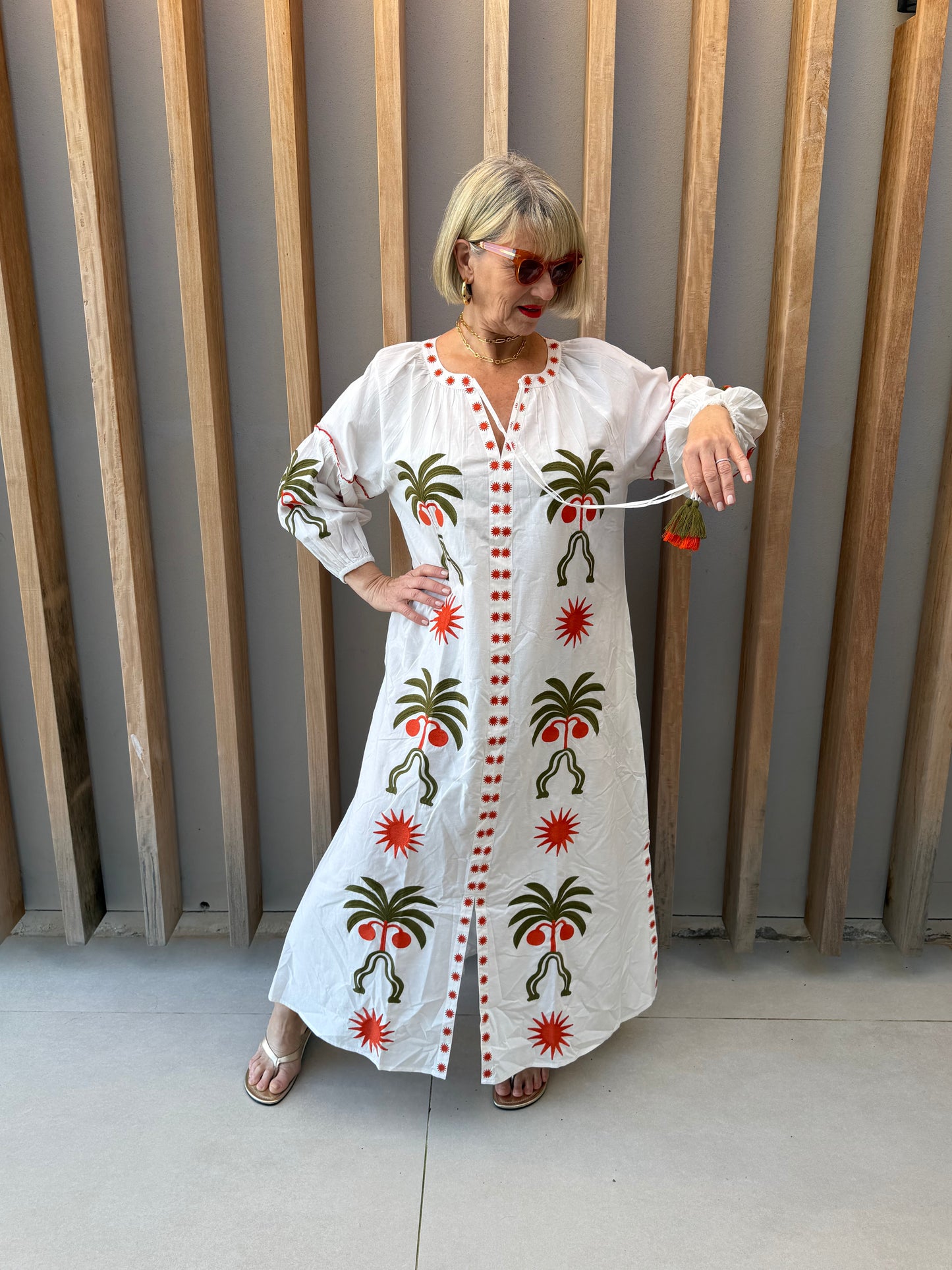 White dress with geometric palm pattern
