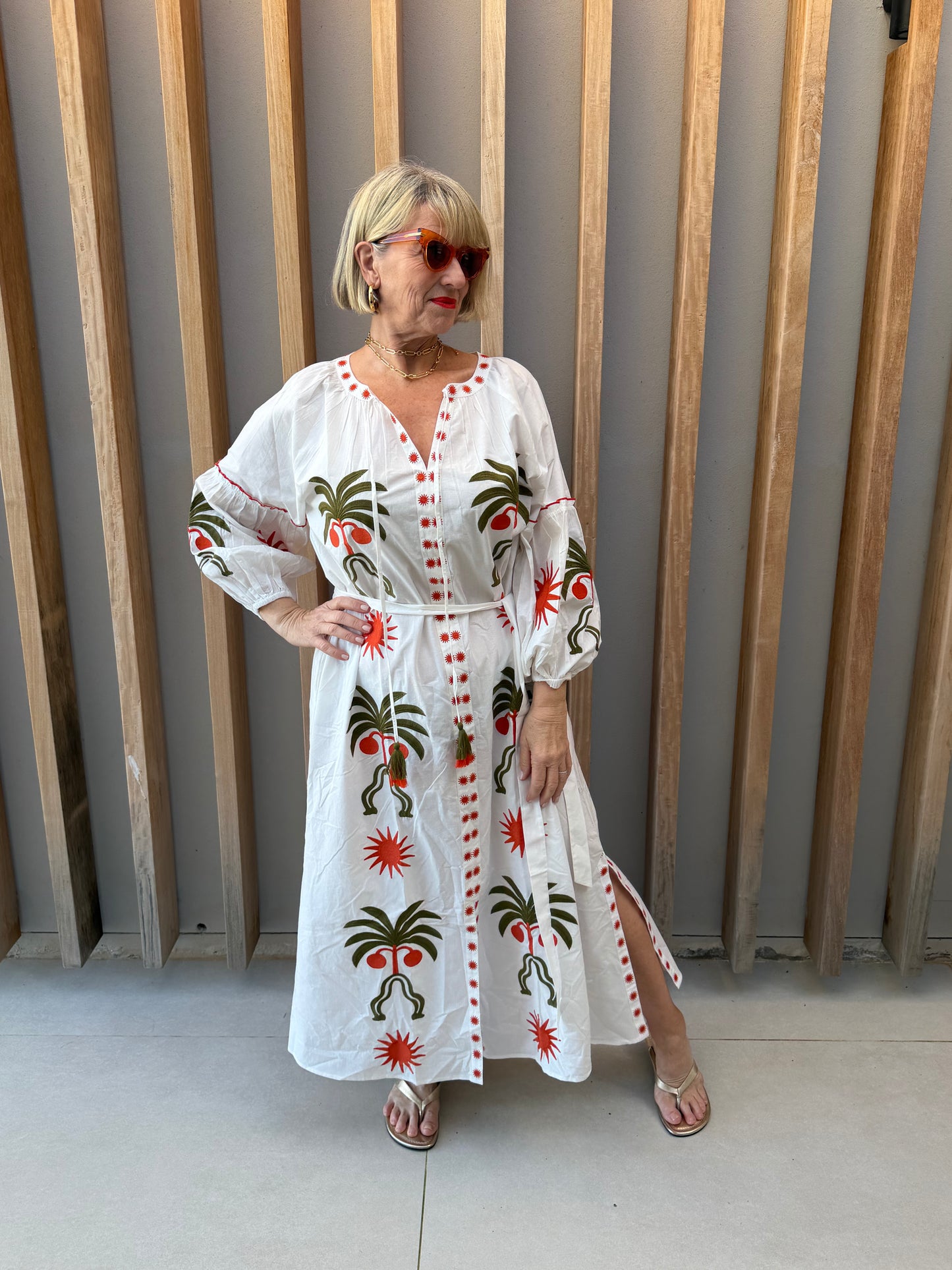 White dress with geometric palm pattern