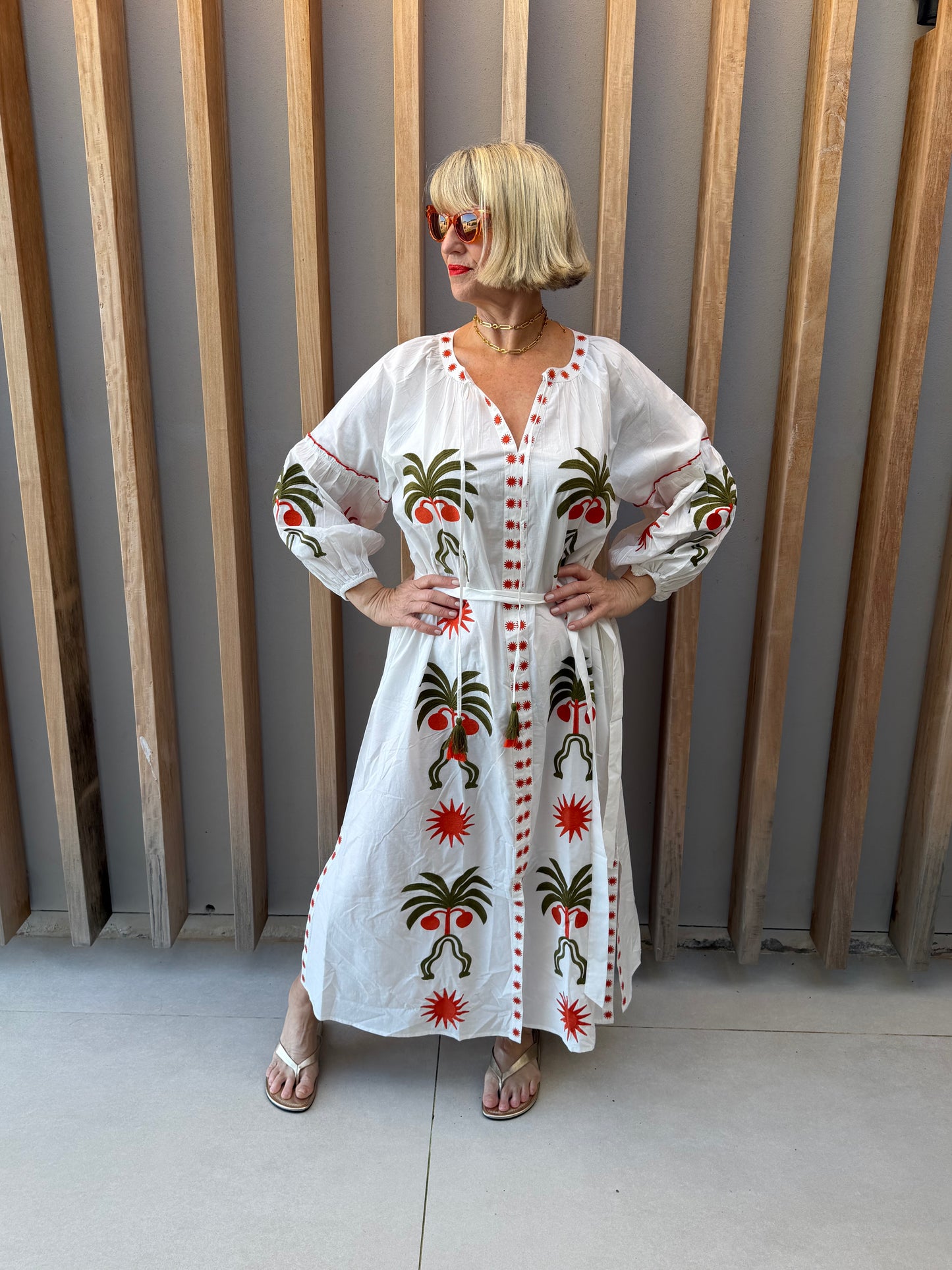 White dress with geometric palm pattern