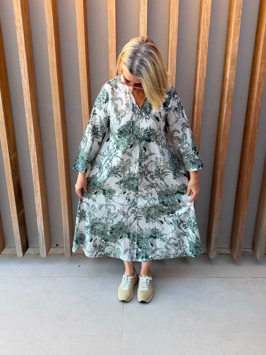 White dress with green animal palm pattern