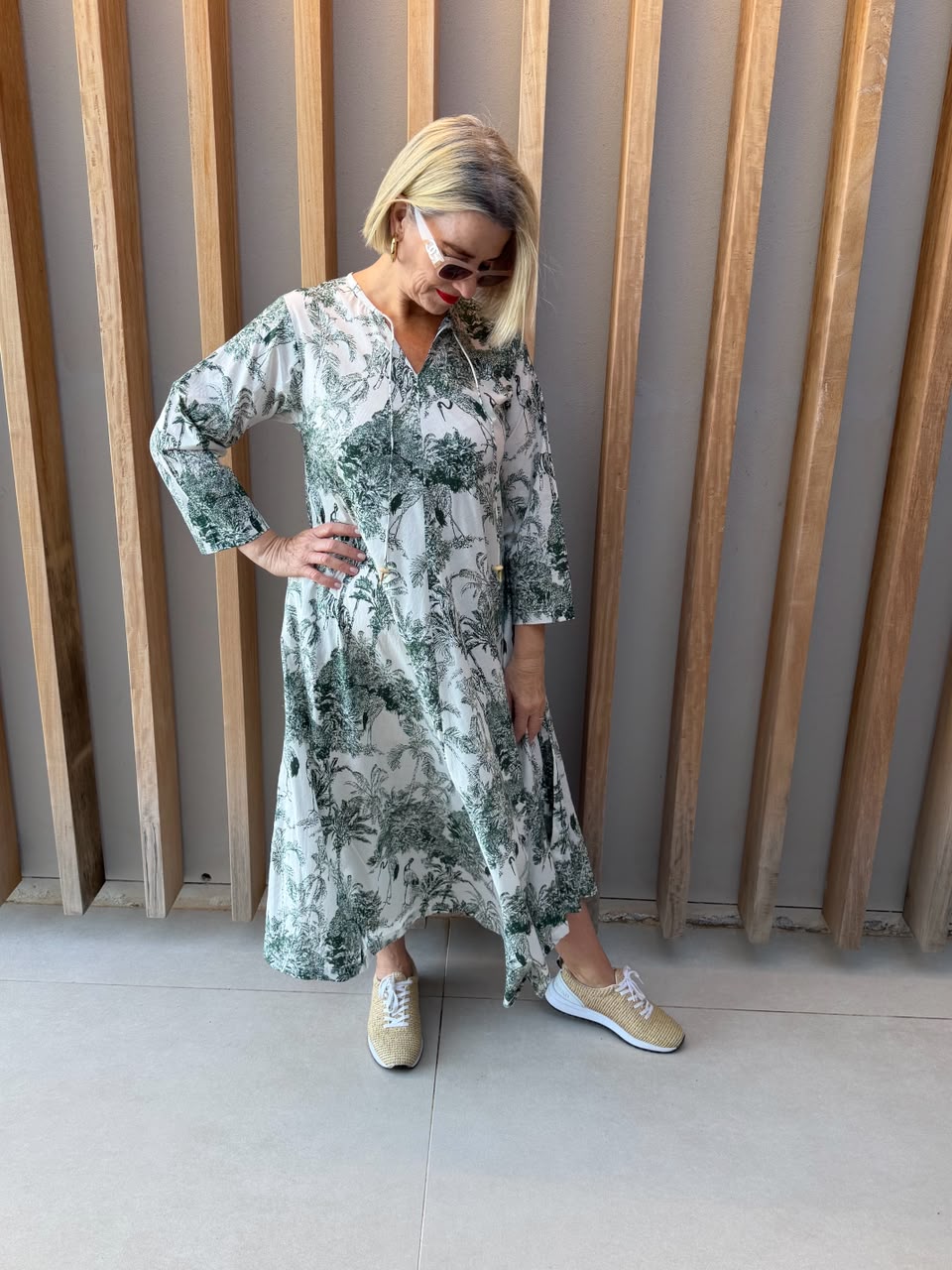 White dress with green animal palm pattern