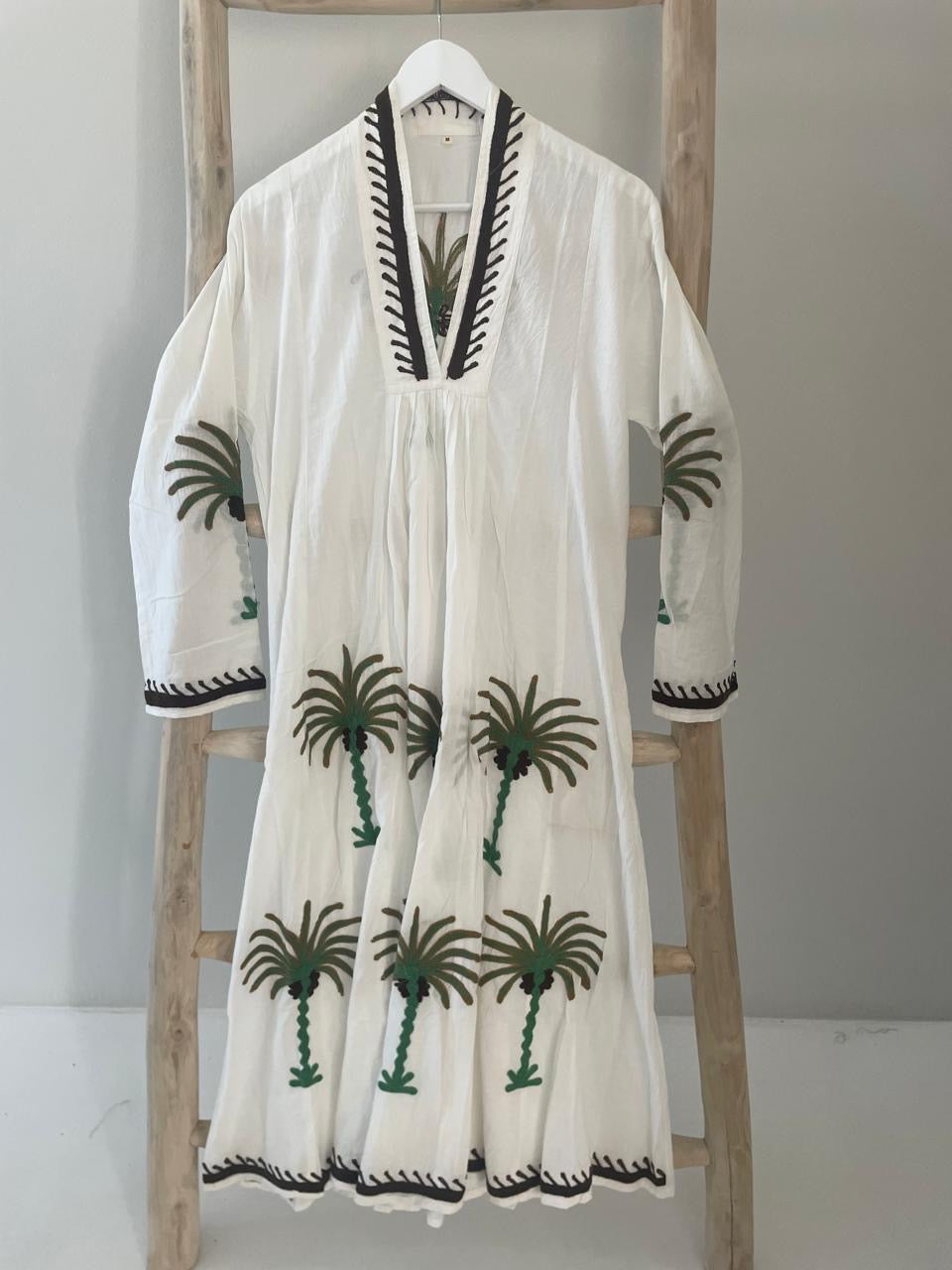 White dress with embroidered green & brown palm