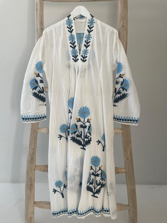 White dress with embroidered blue & green daisies