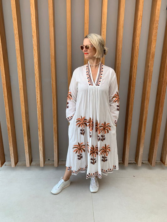 White dress with embroidered orange & brown palm