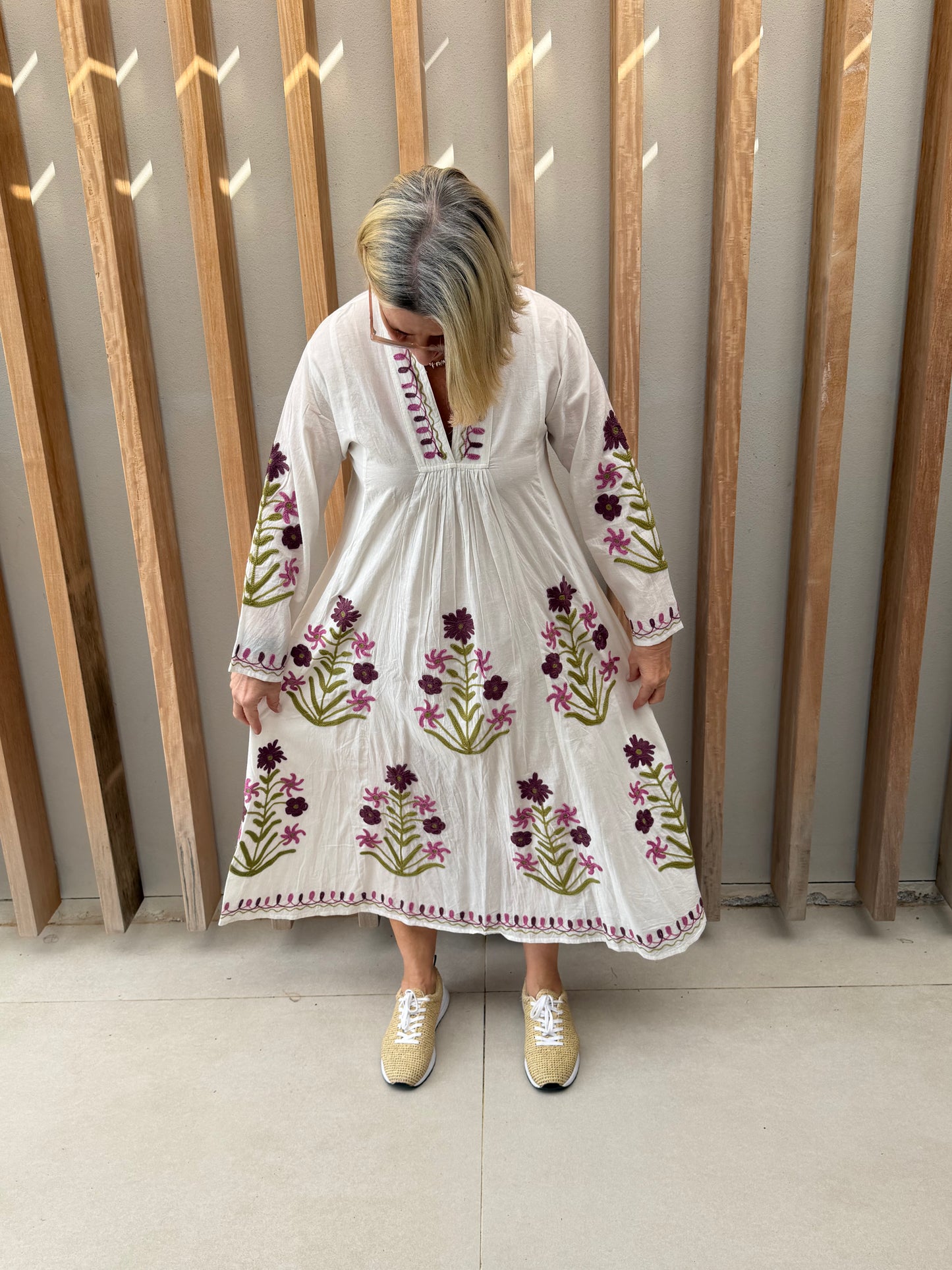 White dress with embroidered pink & green daisies
