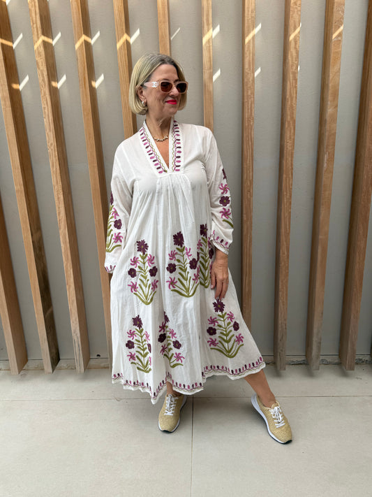 White dress with embroidered pink & green daisies