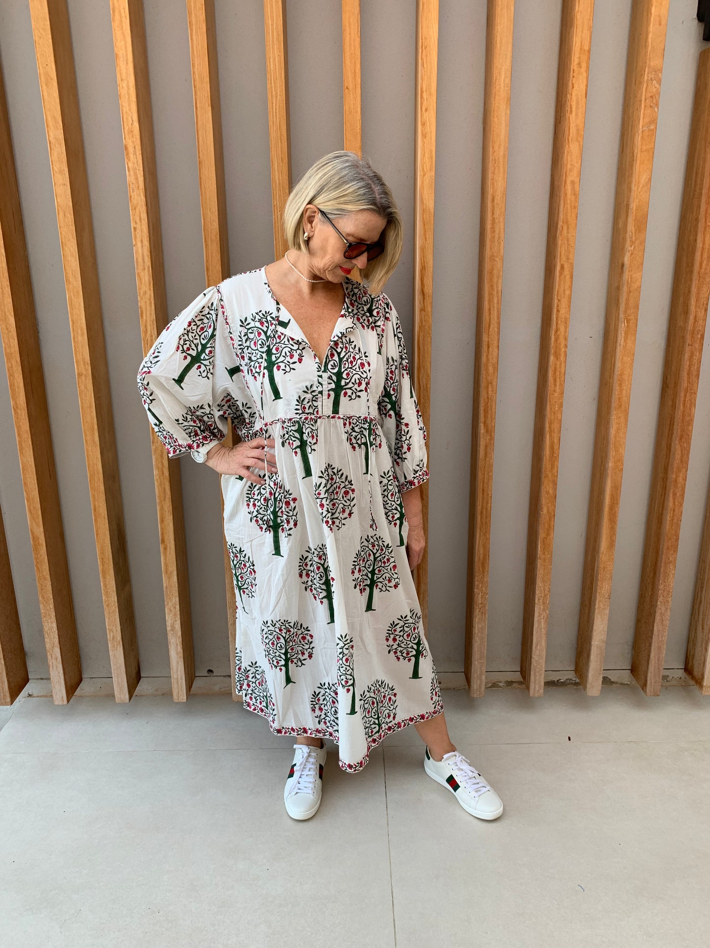 White dress with pomegranate tree pattern
