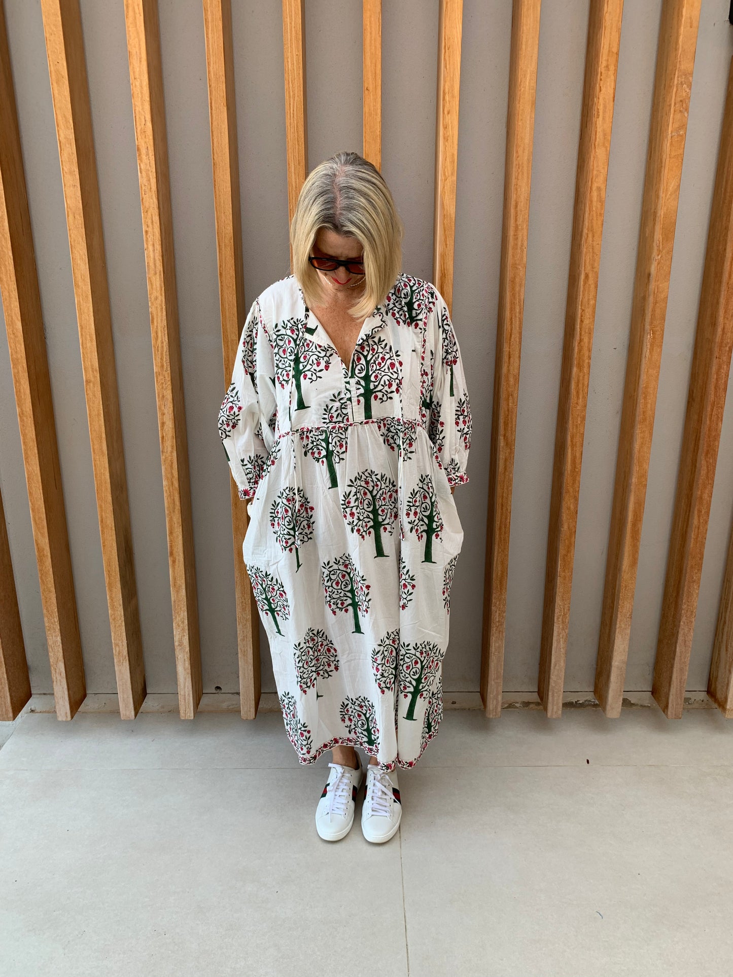 White dress with pomegranate tree pattern