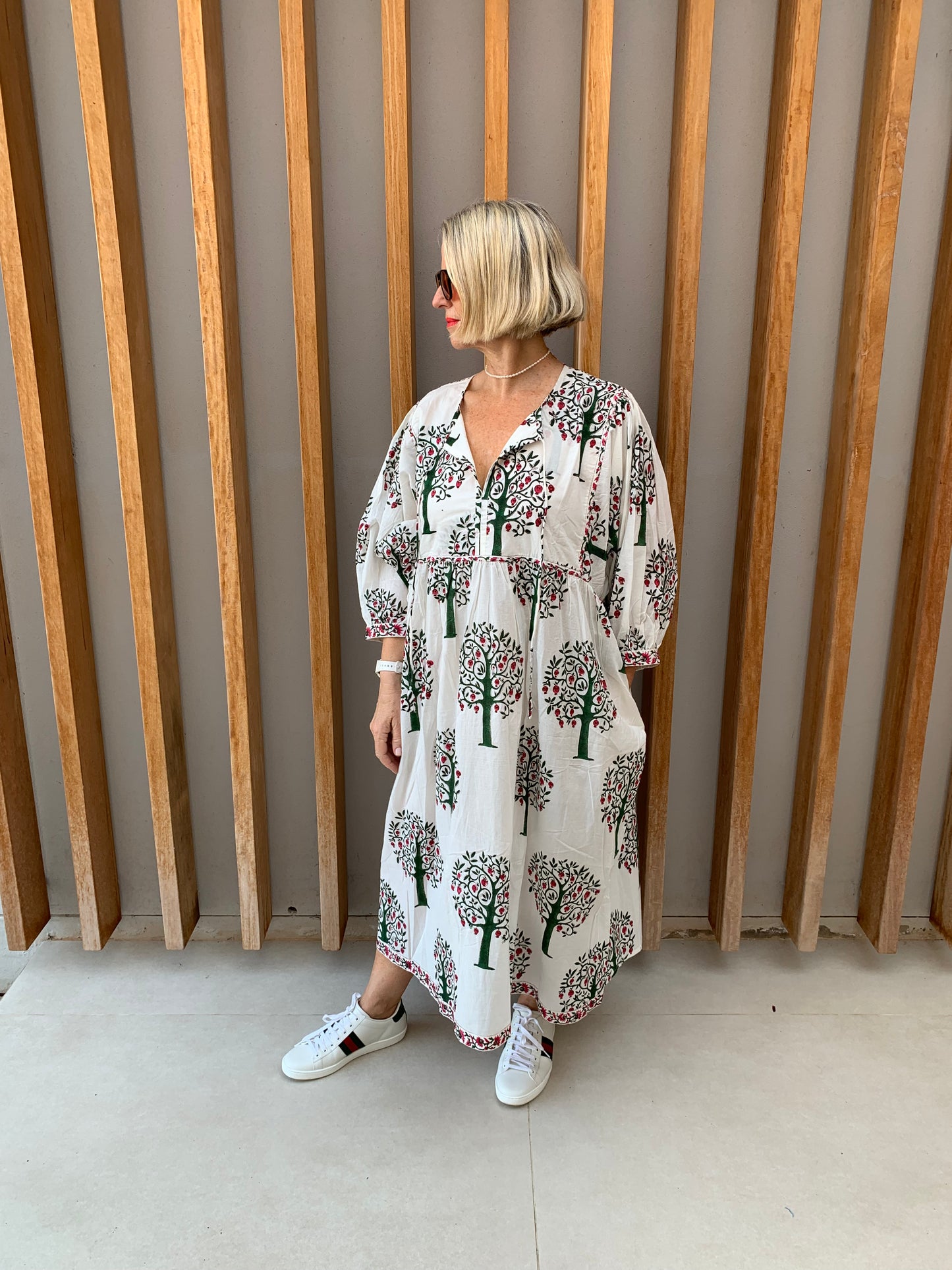 White dress with pomegranate tree pattern