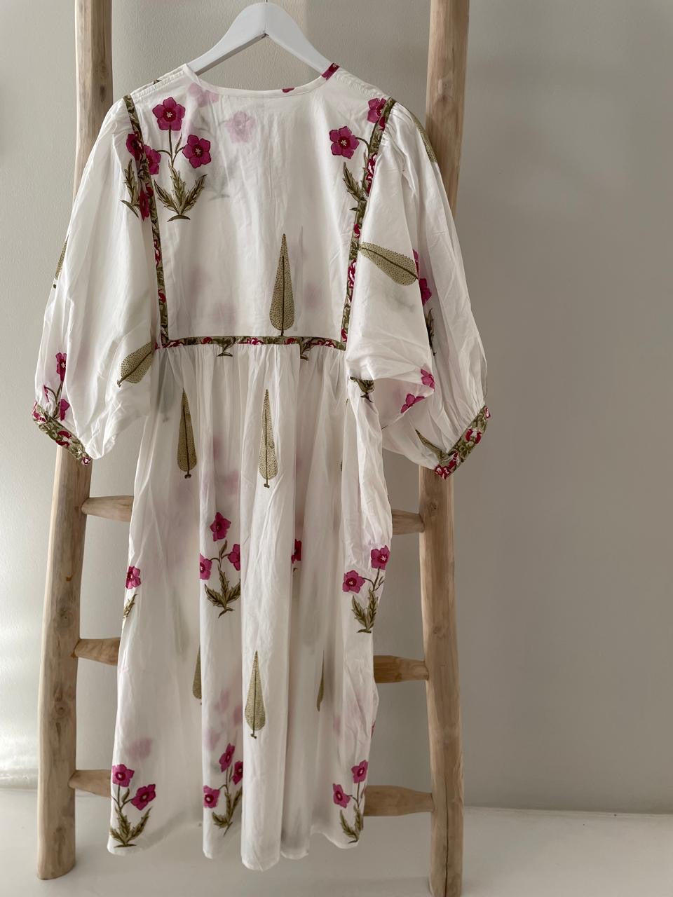 White dress with red & green flower