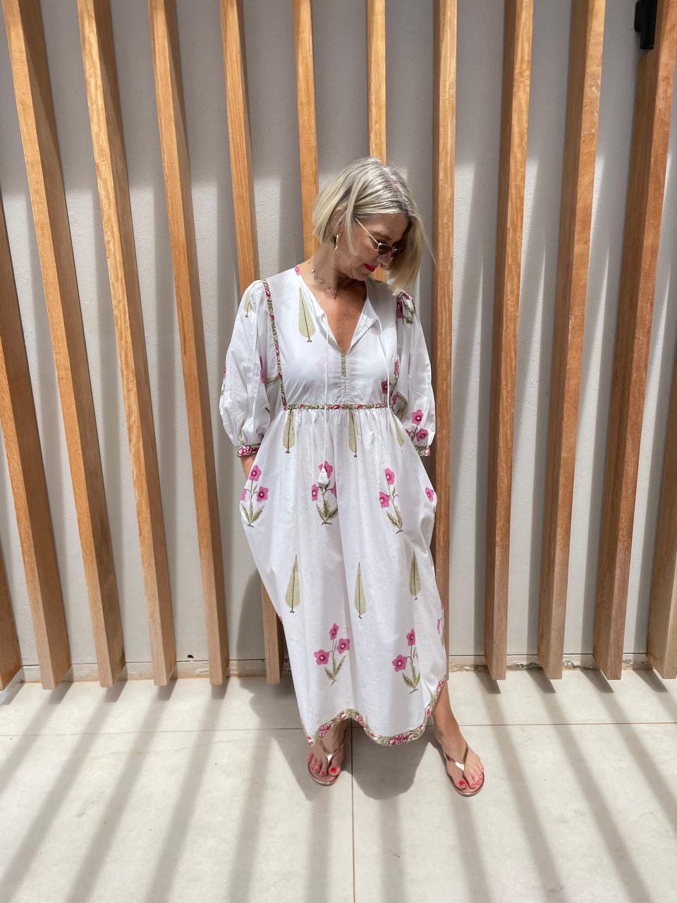 White dress with red & green flower