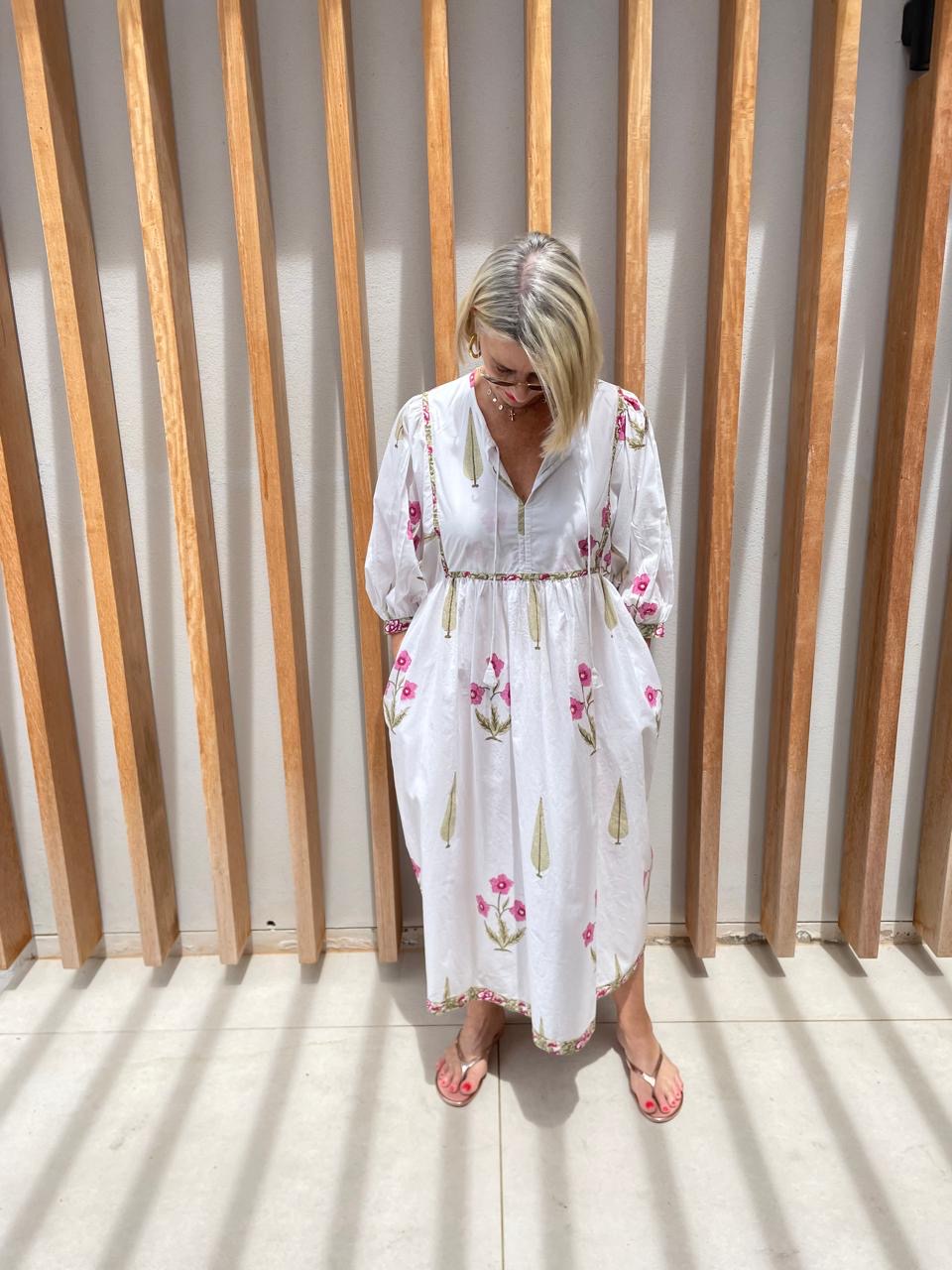 White dress with red & green flower