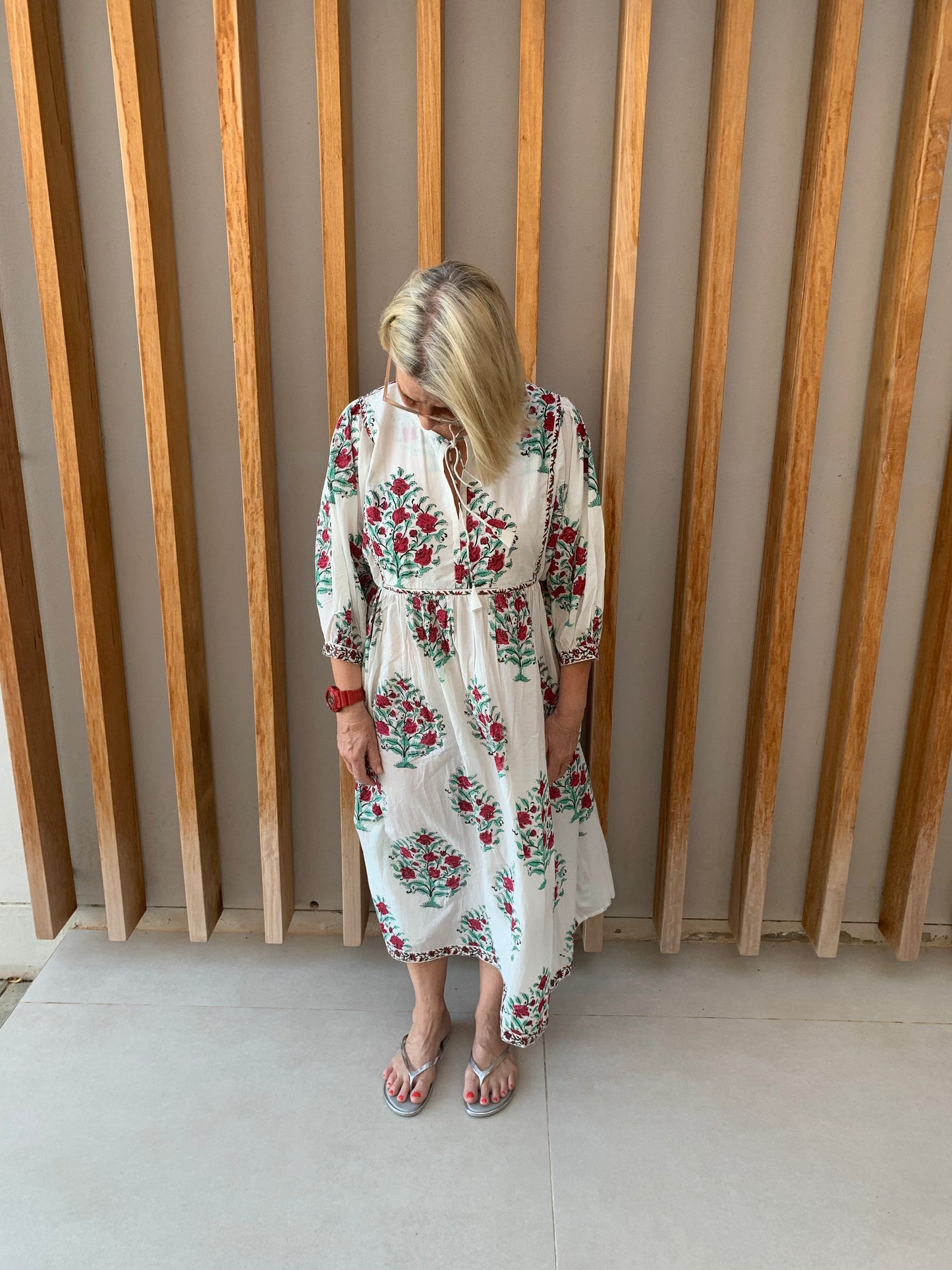 White dress with green tree & red flower pattern