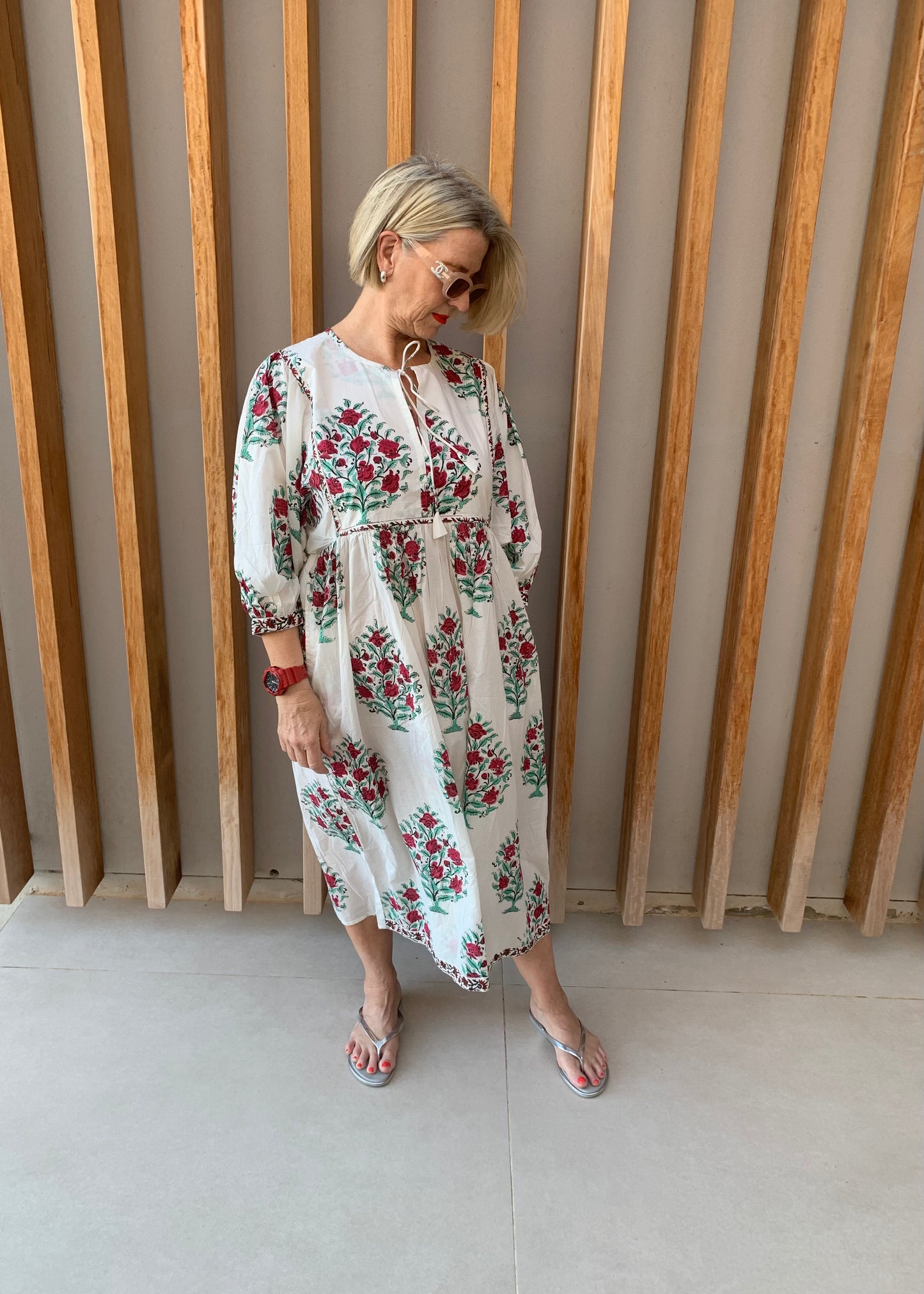 White dress with green tree & red flower pattern