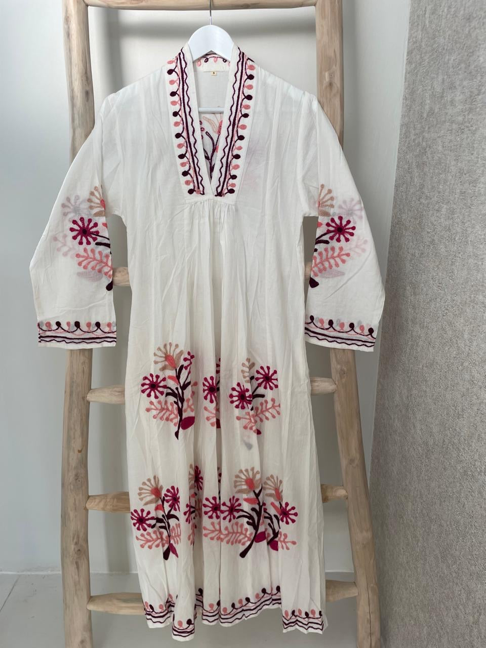 White dress with embroidered red & pink flowers