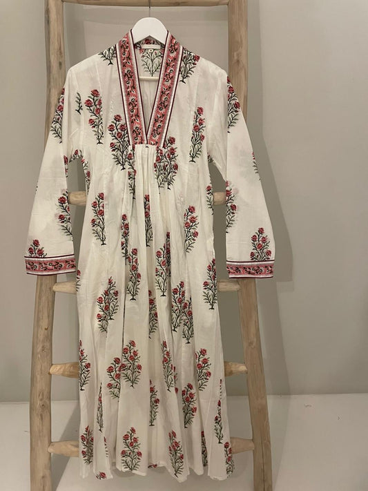 White dress with red roses