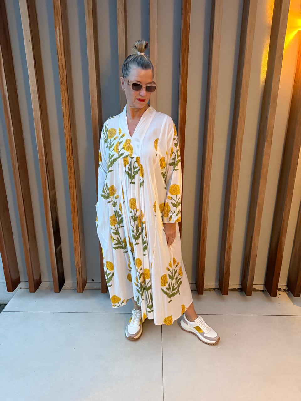 White dress with yellow poppies pattern
