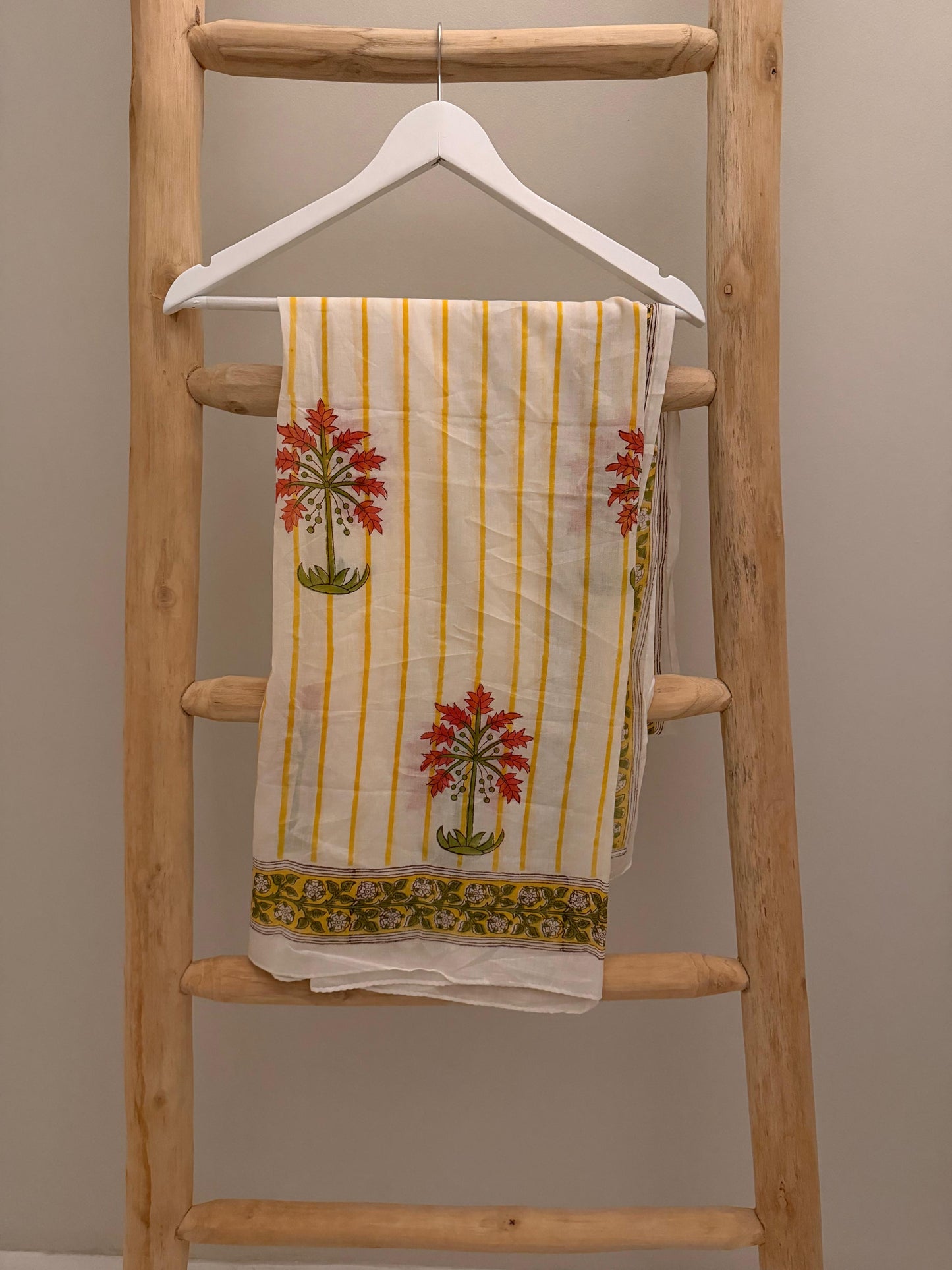 White Sarong with yellow stripe & red floral pattern