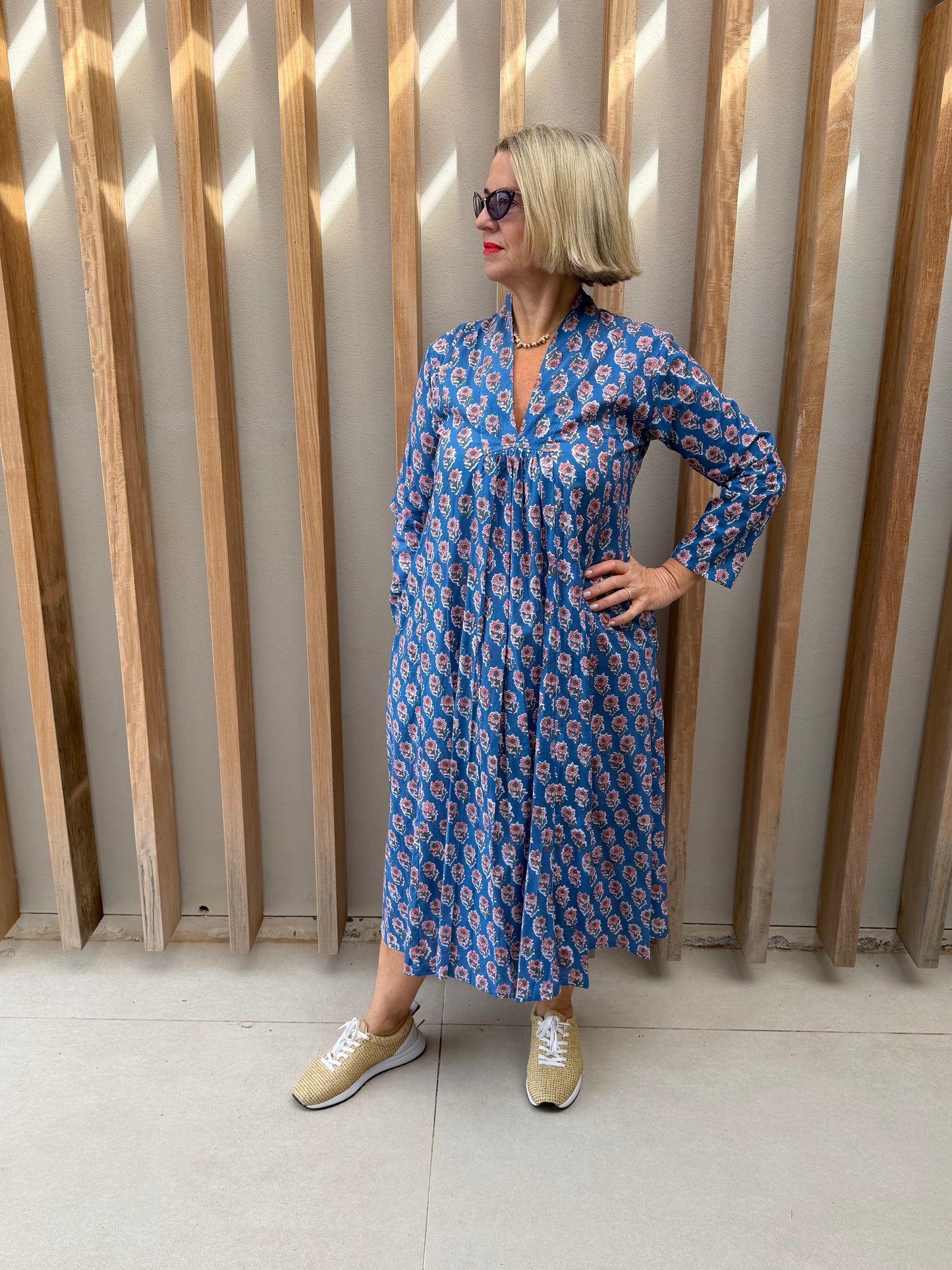 Blue dress with pink floral pattern