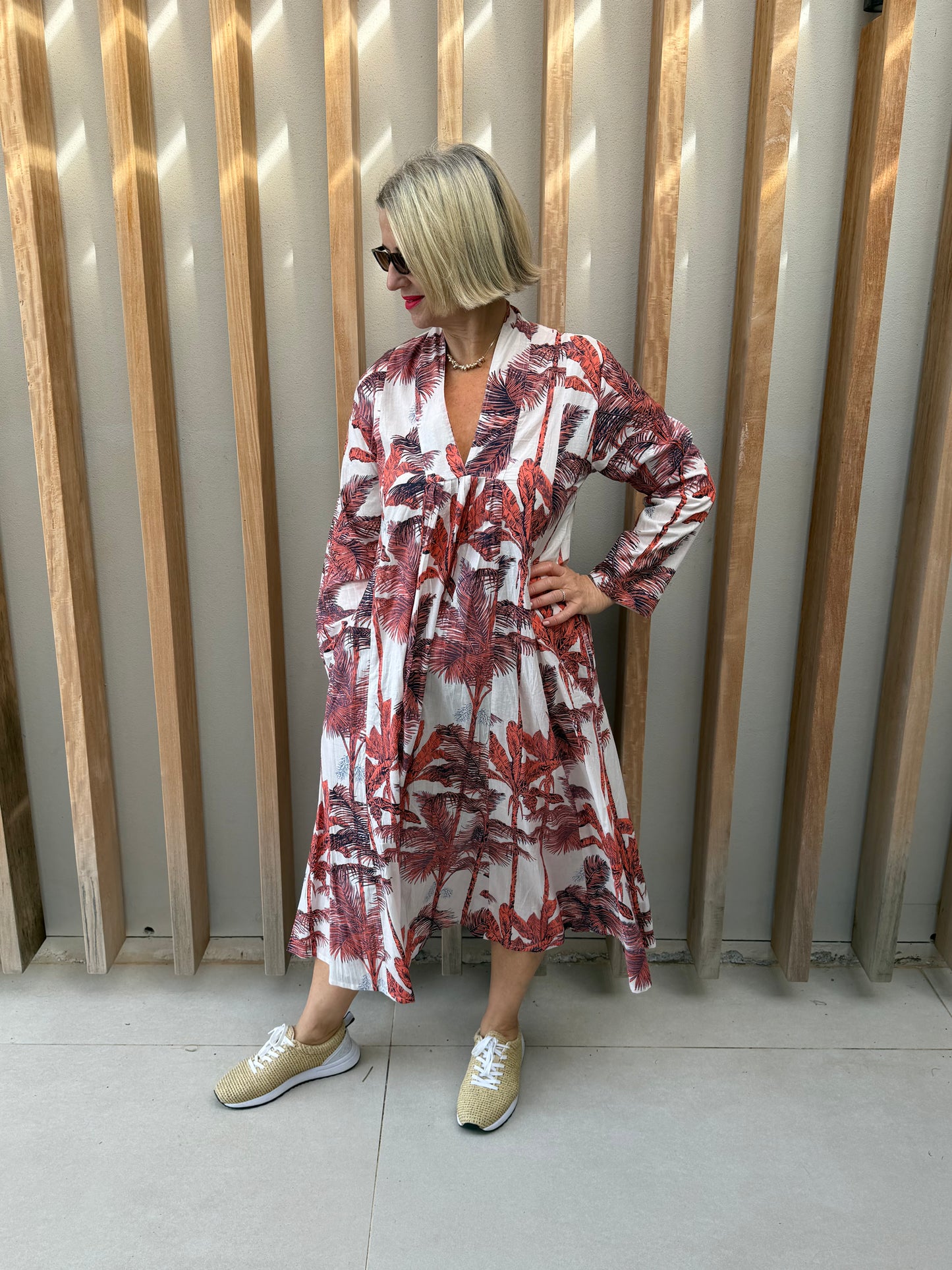 White dress with burned orange palm pattern