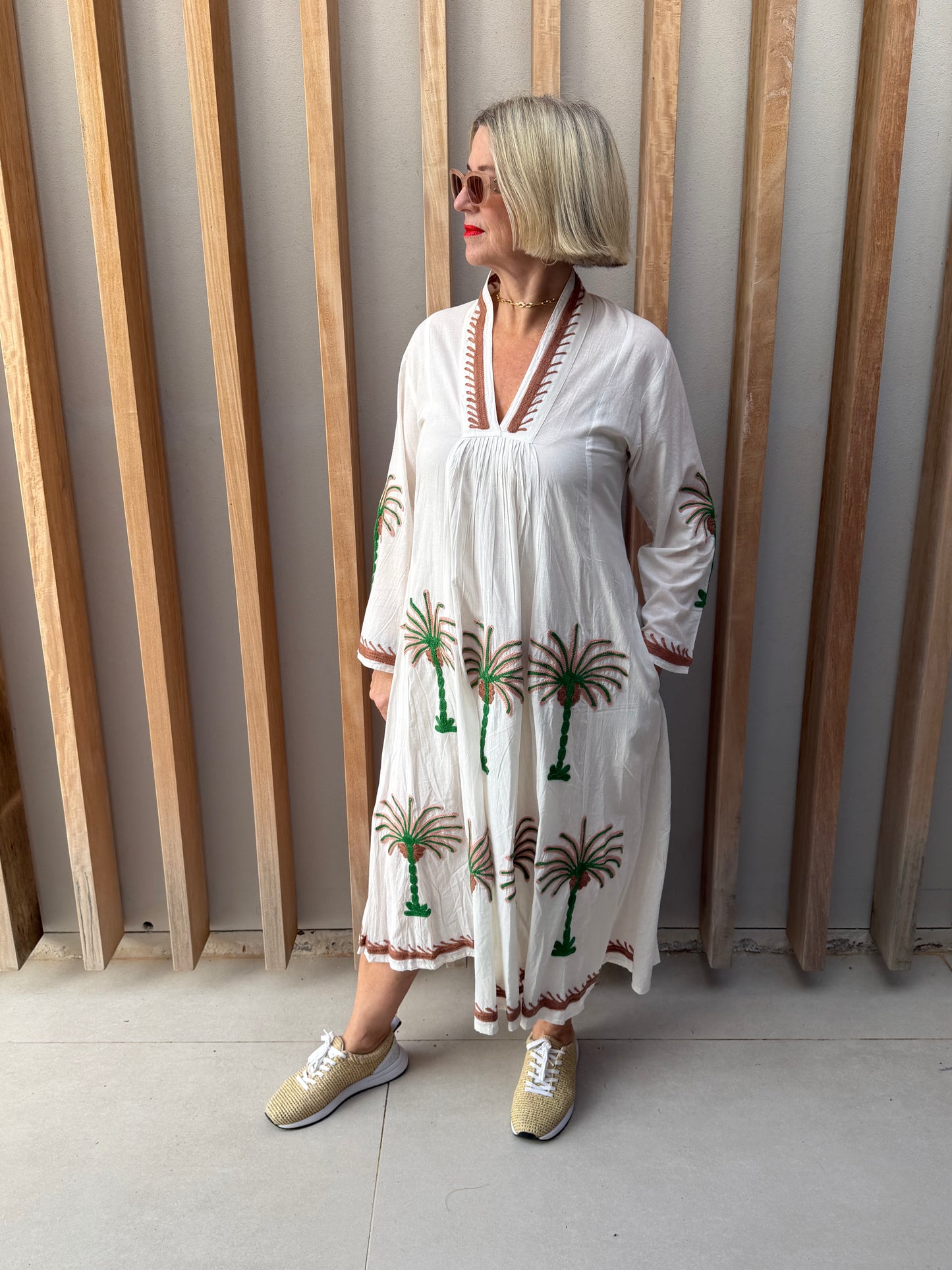 White dress with embroidered green & brown palm