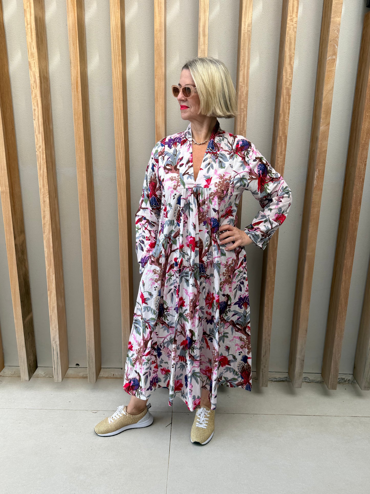 White dress with pink & purple floral pattern
