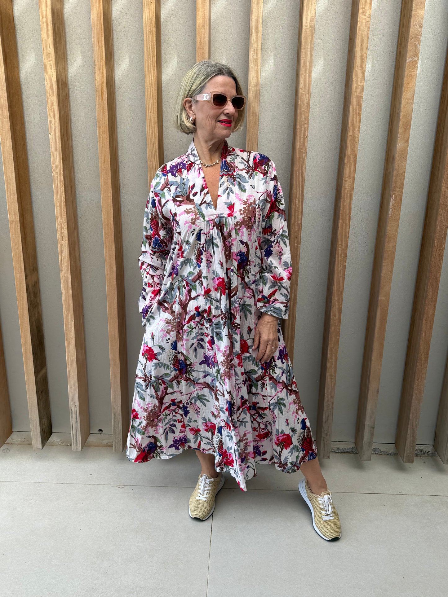 White dress with pink & purple floral pattern