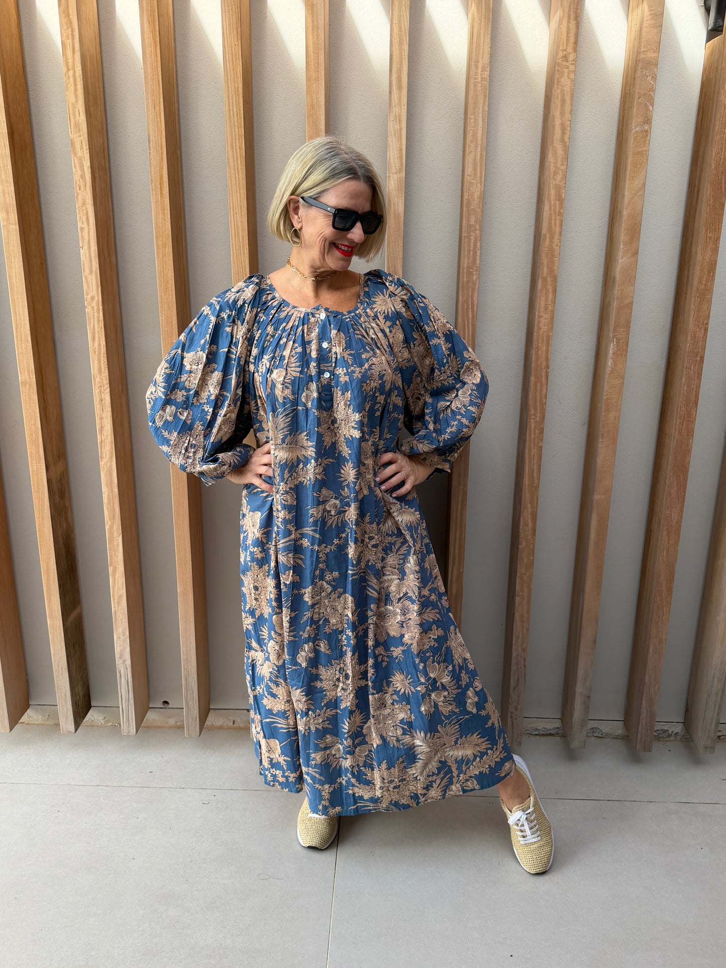 Sky blue dress with beige floral pattern