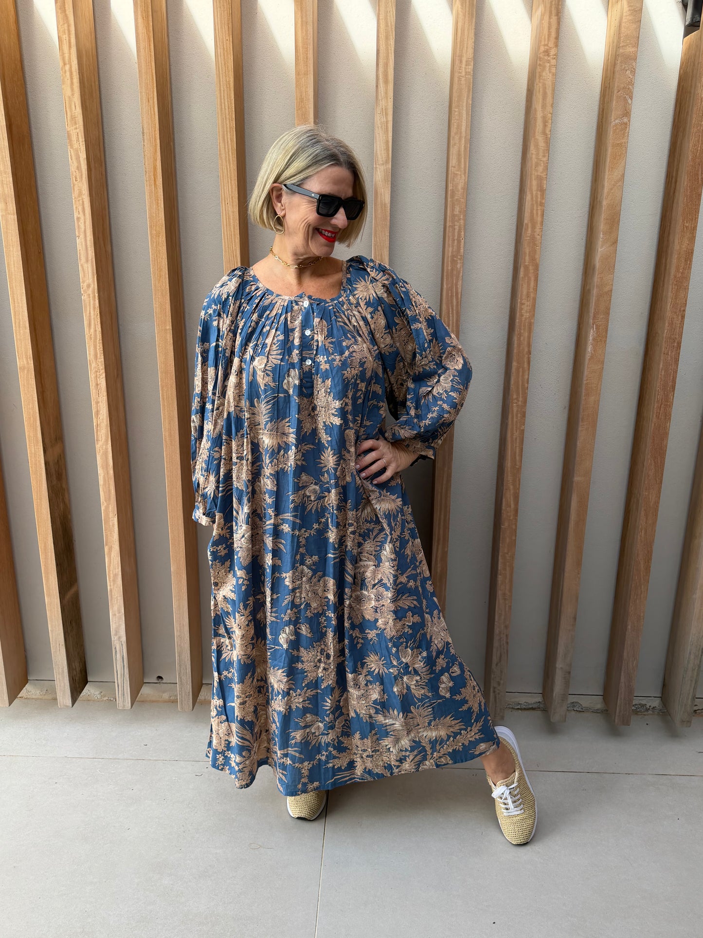 Sky blue dress with beige floral pattern