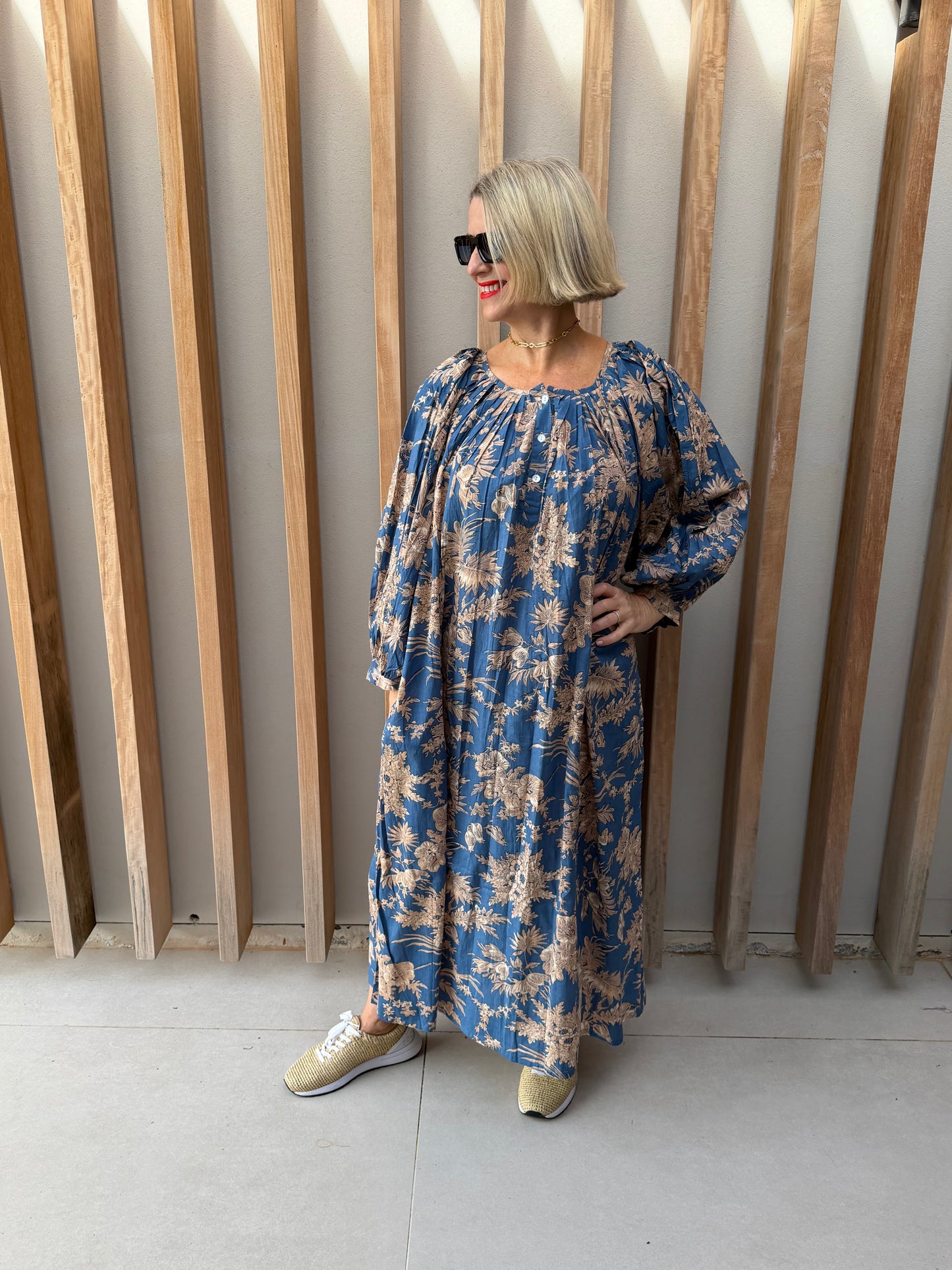 Sky blue dress with beige floral pattern